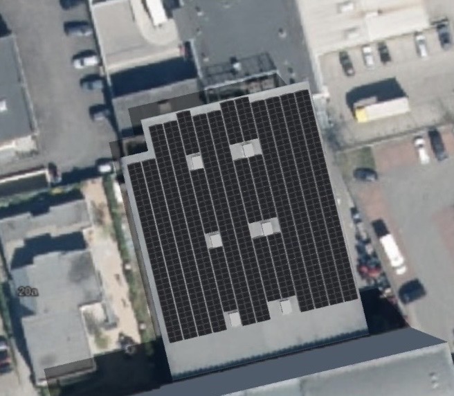 Luftbild der Gewerbeanlage in Düsseldorf mit 334 kWp Photovoltaik auf einem Flachdach